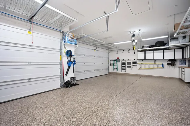 a view of a city with lush green forest