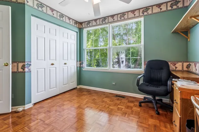 a workspace with furniture and a window