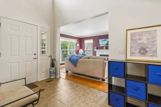 a bed room with a bed and a window