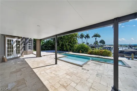 a view of a yard with swimming pool