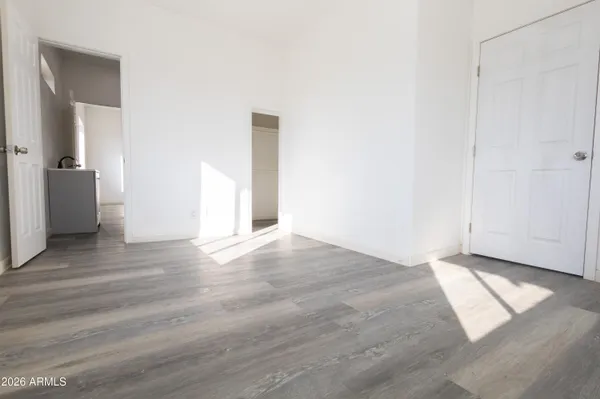 a bathroom with a sink and mirror