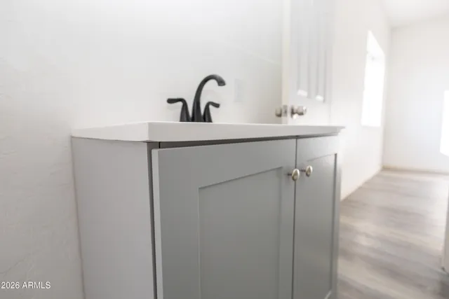 a bathroom with a bathtub and a sink