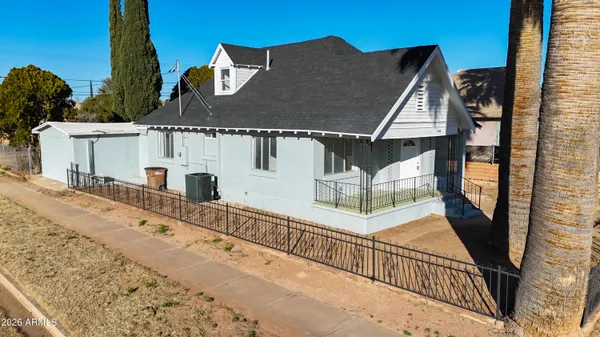 front view of a house with a small yard