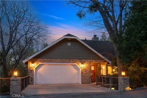 a outdoor dining space with furniture and wooden floor