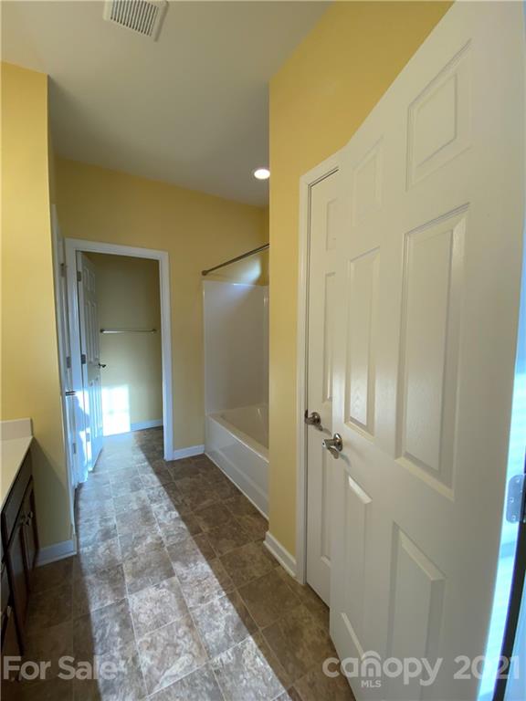 12 South River Road Fletcher, NC 28732 - Photo 13 of 21 a bathroom with a glass door shower