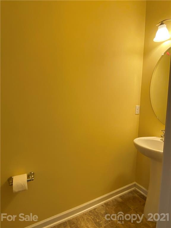 12 South River Road Fletcher, NC 28732 - Photo 4 of 21 a bathroom with a sink