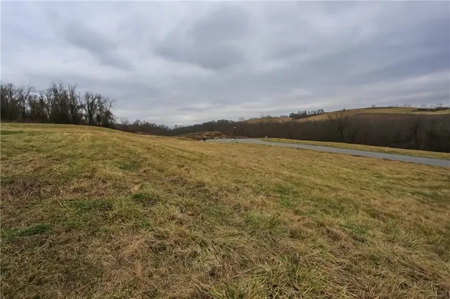 a view of an ocean and mountain