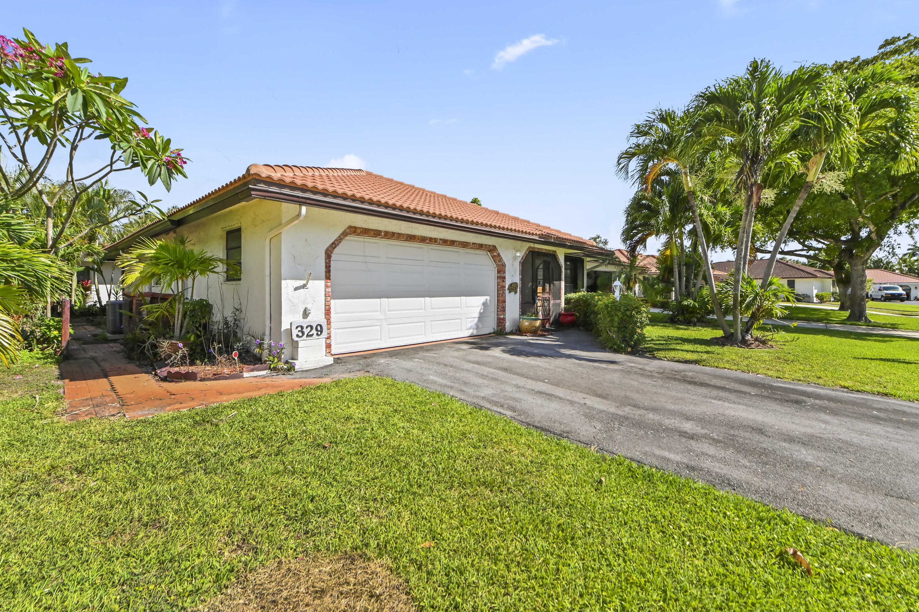 329 Knob Hill Boulevard Boca Raton, FL 33431 - Photo 3 of 35 Front