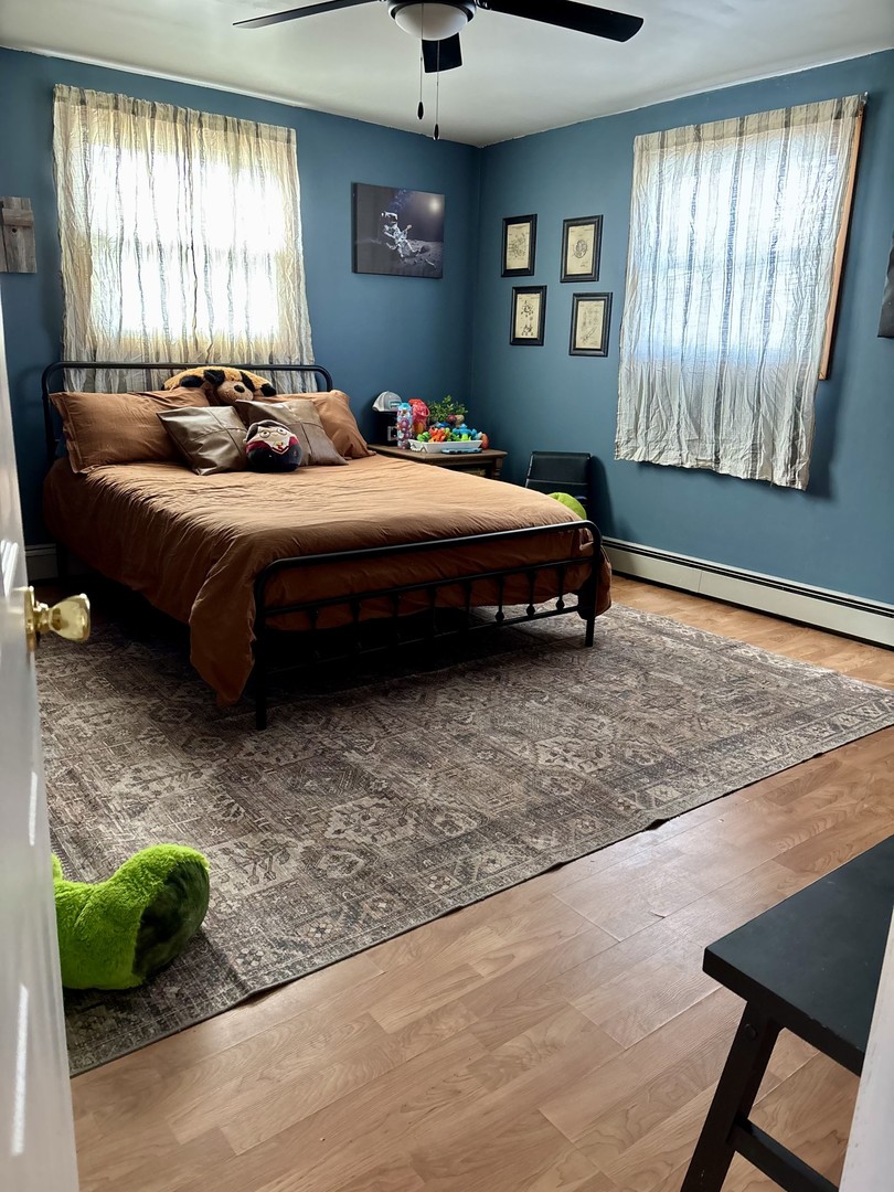 3330 Airport Road LaSalle, IL 61301 - Photo 13 of 15 a bedroom with a bed mirror and window