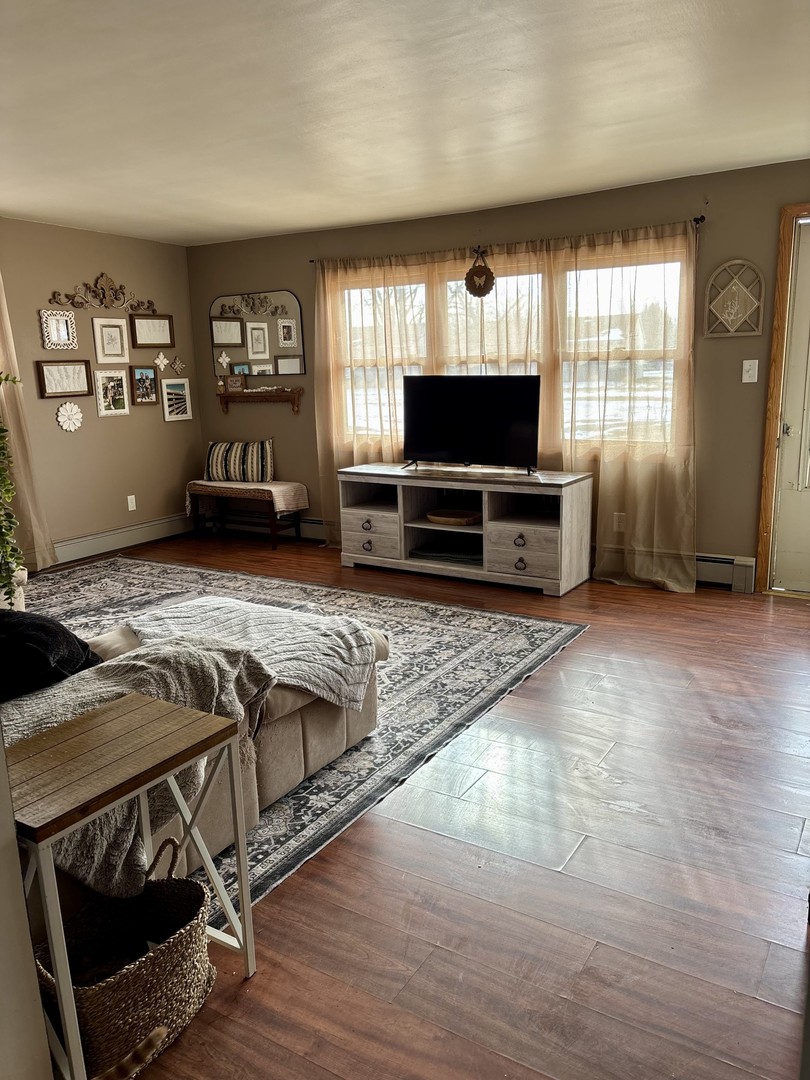 3330 Airport Road LaSalle, IL 61301 - Photo 4 of 15 a living room with furniture and a flat screen tv