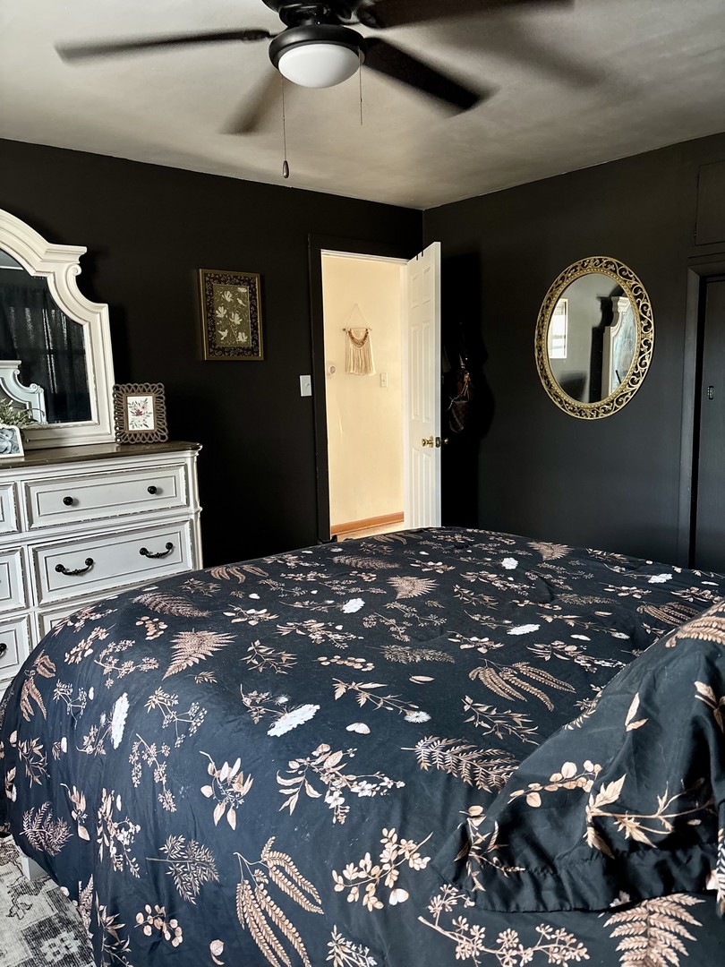 3330 Airport Road LaSalle, IL 61301 - Photo 10 of 15 a bedroom with a bed and a dresser