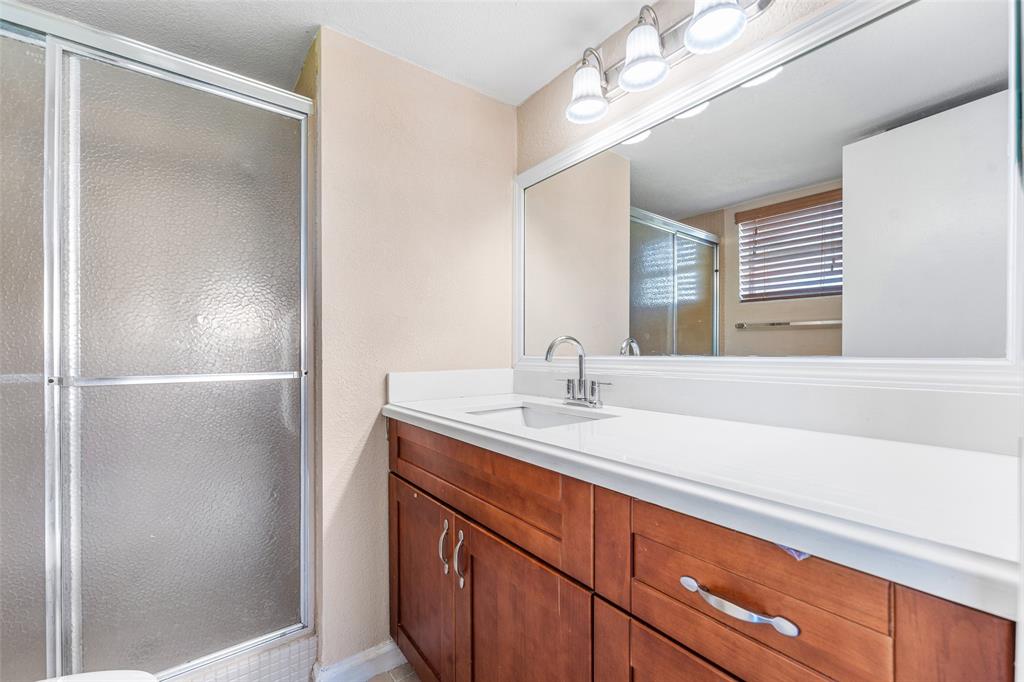 2720 North Pine Island Road, Unit 212 Sunrise, FL 33322 - Photo 14 of 49 MAIN BATHROOM UPDATED & WALK IN SHOWER