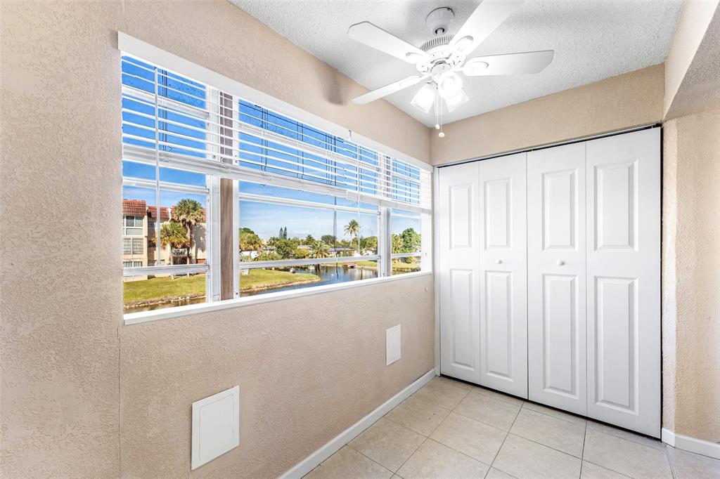 2720 North Pine Island Road, Unit 212 Sunrise, FL 33322 - Photo 8 of 49 BONUS DEN ROOM WITH WATER VIEW