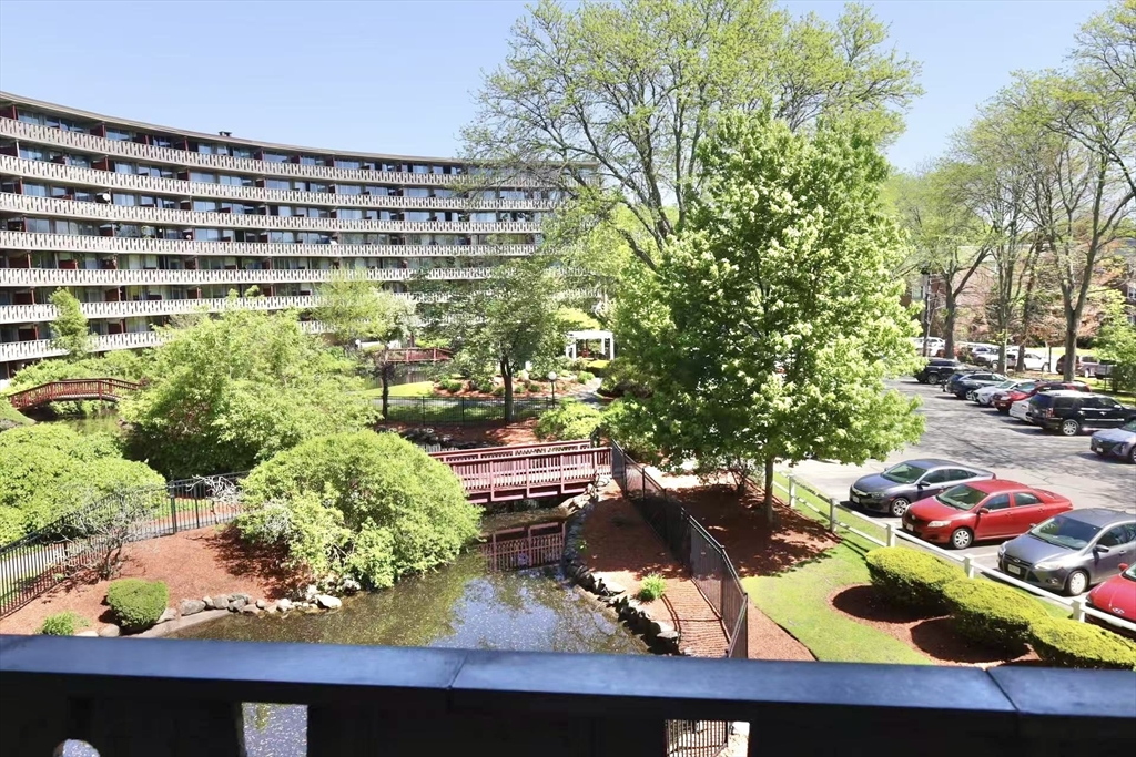 a view of swimming pool from a balcony