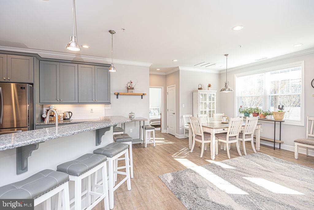 11910 Back Creek Road Bishopville, MD 21813 - Photo 12 of 94 a large kitchen with a table and chairs