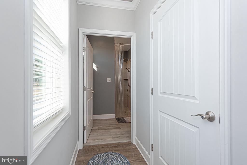 11910 Back Creek Road Bishopville, MD 21813 - Photo 27 of 94 a view of a bathroom from the hallway
