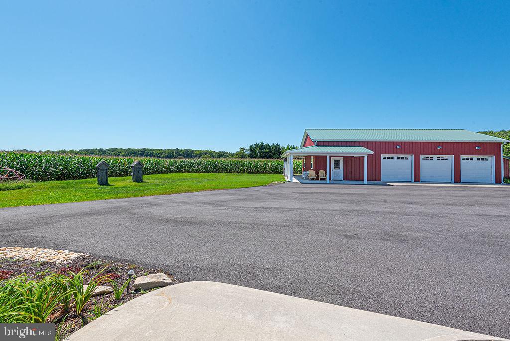 11910 Back Creek Road Bishopville, MD 21813 - Photo 78 of 94 a house view with a garden space