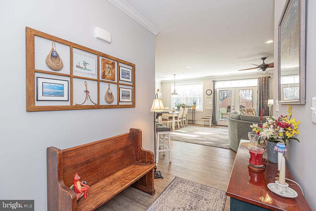 11910 Back Creek Road Bishopville, MD 21813 - Photo 9 of 94 a living room with furniture flowerpot and a chandelier