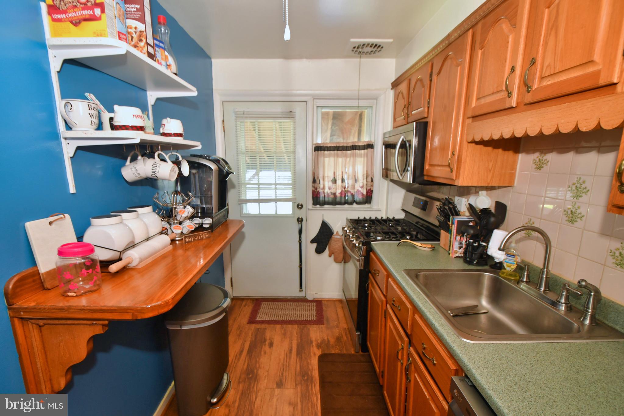 1949 Searles Road Baltimore, MD 21222 - Photo 12 of 45 Updated cabinets, stainless stove, micro, and DW