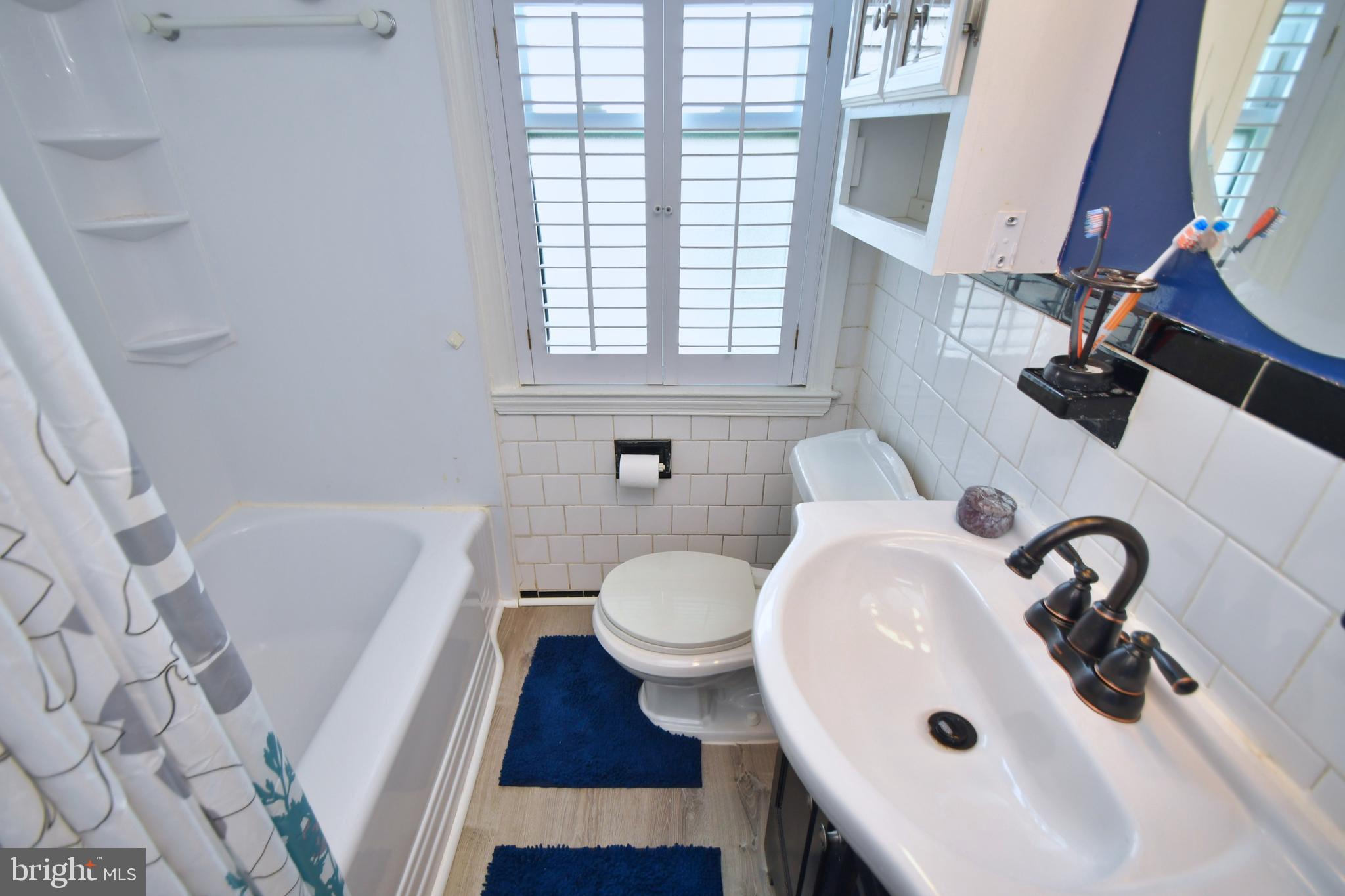 1949 Searles Road Baltimore, MD 21222 - Photo 27 of 45 Updated flooring, toilet and vanity
