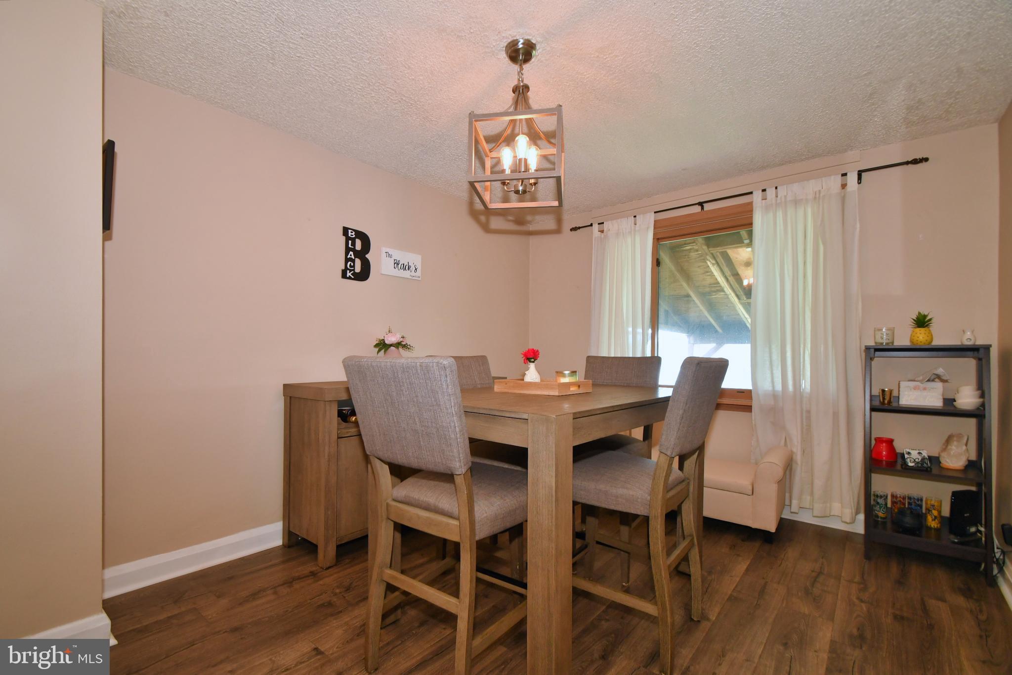 1949 Searles Road Baltimore, MD 21222 - Photo 8 of 45 Huge dining room, updated flooring, chandelier