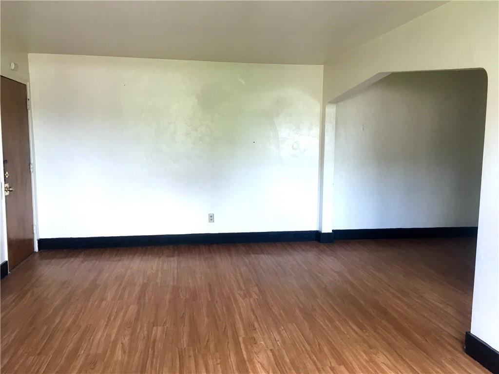 666 Florida Pittsburgh, PA 15228 - Photo 2 of 7 a view of a room with wooden floor