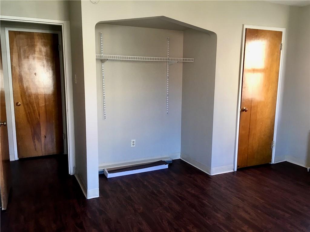 666 Florida Pittsburgh, PA 15228 - Photo 6 of 7 an empty room with wooden floor and closet area