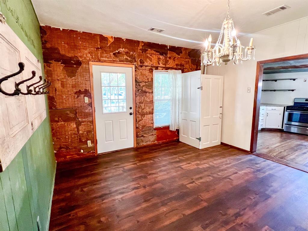 182 Douglas Street Van Alstyne, TX 75495 - Photo 11 of 23 Dining area to back door