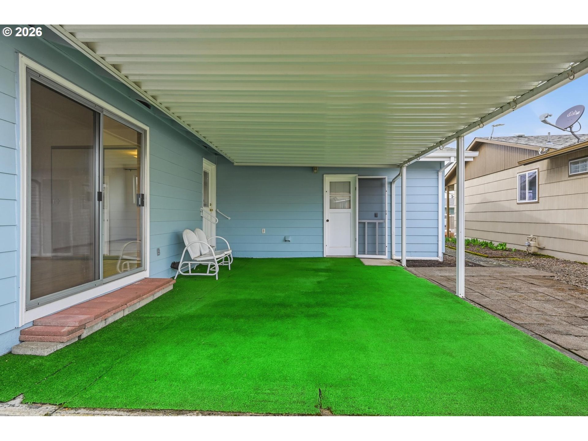 1720 Jansen Way Woodburn, OR 97071 - Photo 35 of 41 a view of a backyard with a garden and entertaining space