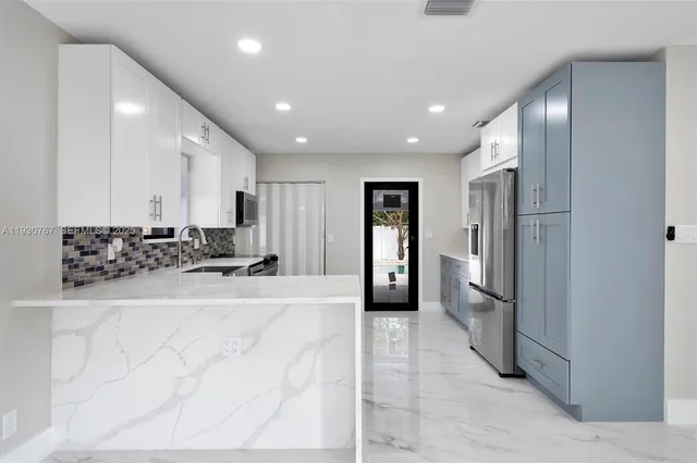 a view of a house with a swimming pool