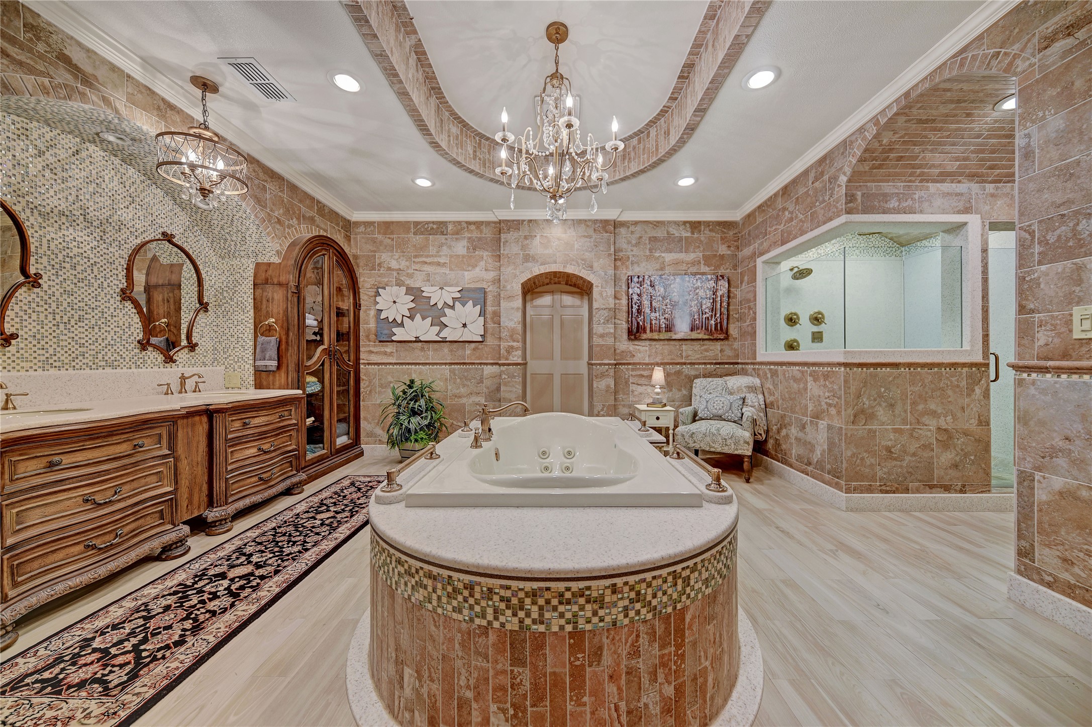 9950 Palestine Road Brenham, TX 77833 - Photo 18 of 49 The coffered ceiling with stone accents provides additional detail to this stunning bathroom. Adjacent to the garden tub is a separate shower with cultured marble and high-end hardware finishes. Notice the barrel-vaulted ceilings and floor-to-ceiling travertine.