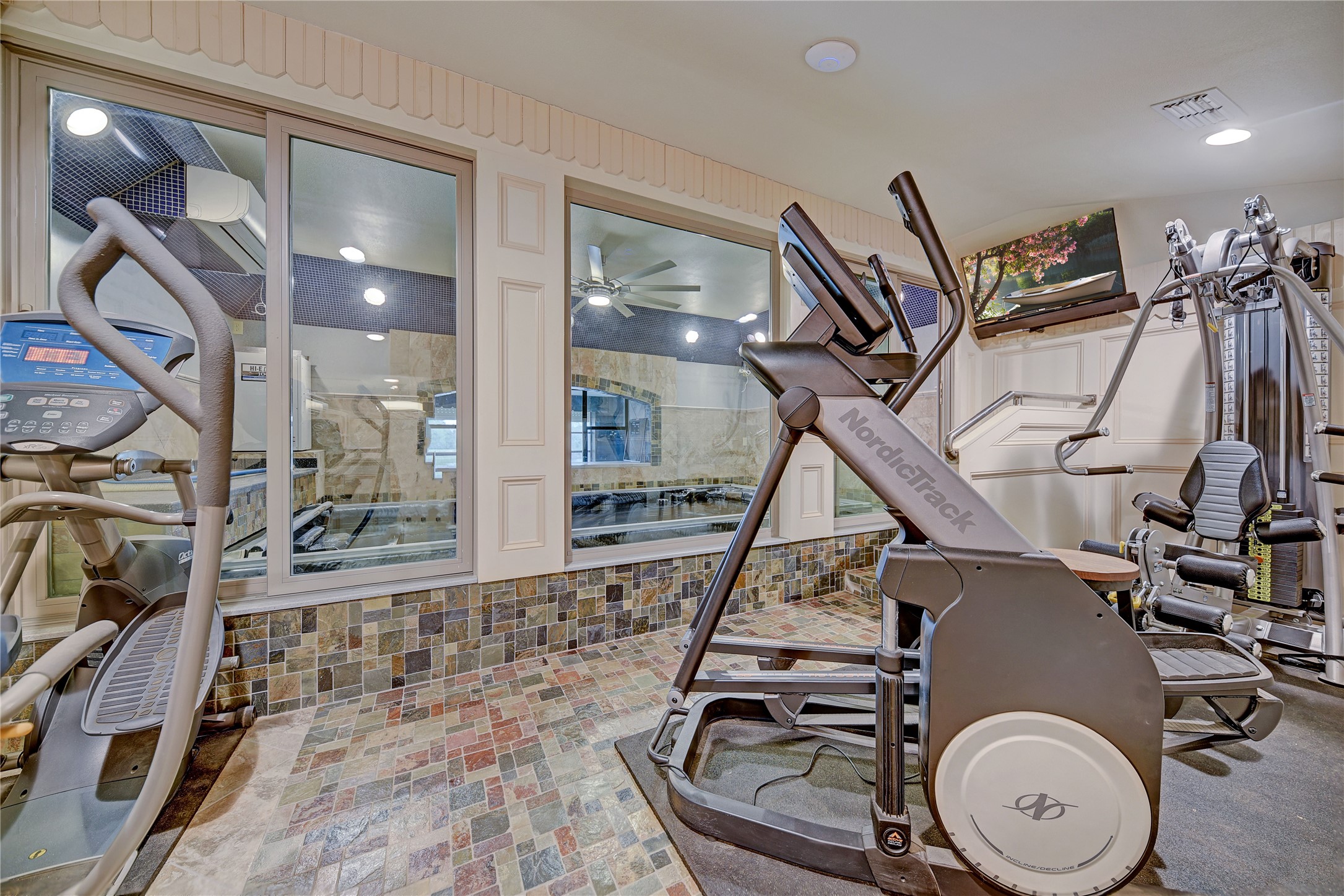 9950 Palestine Road Brenham, TX 77833 - Photo 20 of 49 The private workout space and changing area is conveniently located just outside of the pool area.