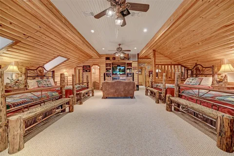 a view of a livingroom with furniture and a chandelier