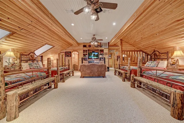 a view of a livingroom with furniture and a chandelier