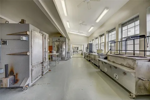a hallway with cabinets