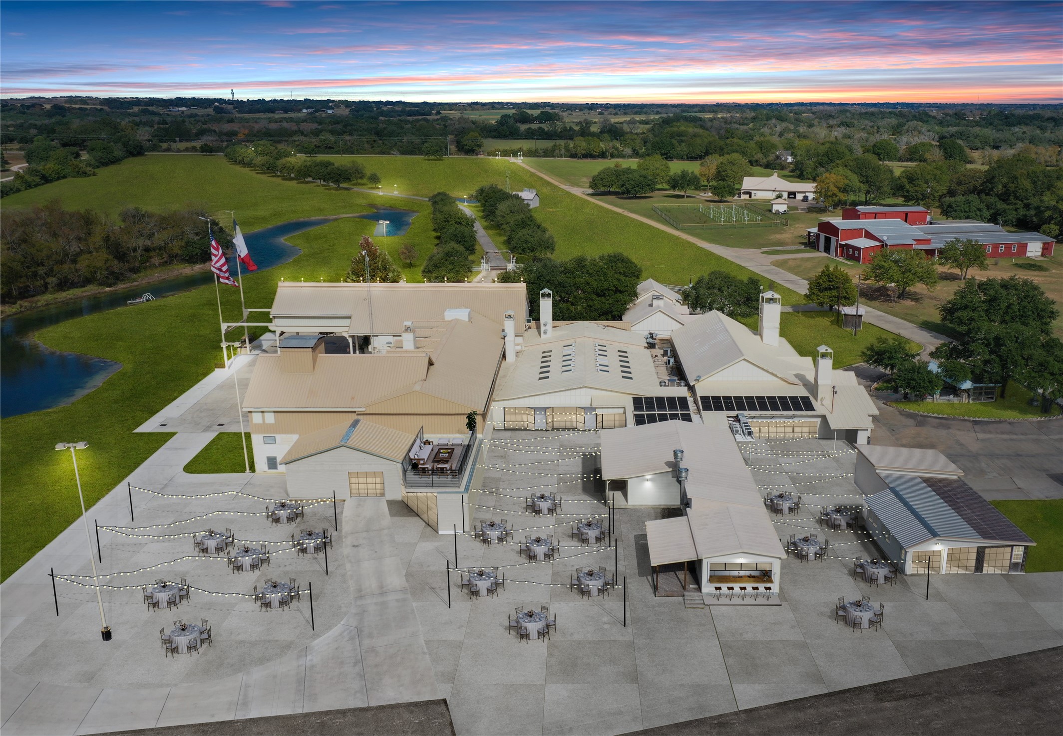 9950 Palestine Road Brenham, TX 77833 - Photo 3 of 49 Virtual Renovation highlights one of many commercial possibilities. The 3,000+ SF finished out 10-car garage, 4,500+ SF recreational pool area, saloon, & 5,000+ SF commercial kitchen & dining room all lead directly out to the outdoor party area offering panoramic land views. This is a virtual renovation and this picture does not portray the home as is.