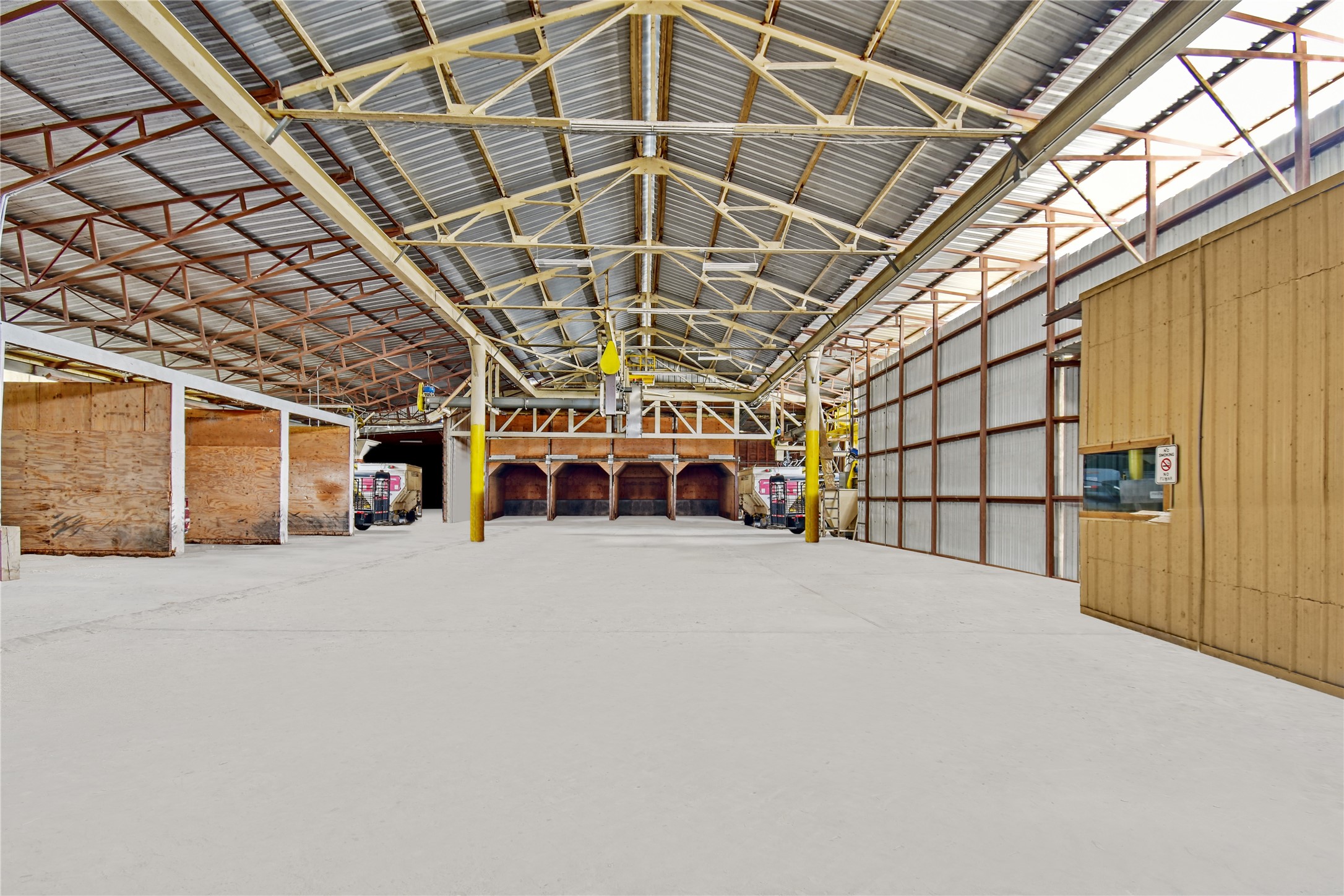 9950 Palestine Road Brenham, TX 77833 - Photo 44 of 49 The feed manufacturing facility also has legs running to your choice of 3 exterior silos, 2 additional storage silos, loading docks, 8 dividers to separate your commodities, and is constructed with steel support beams, steel rafters holding the conveyor systems in place, and a metal roof. The machine shop, equestrian facilities, and cattle working pens are all adjacent to this area.