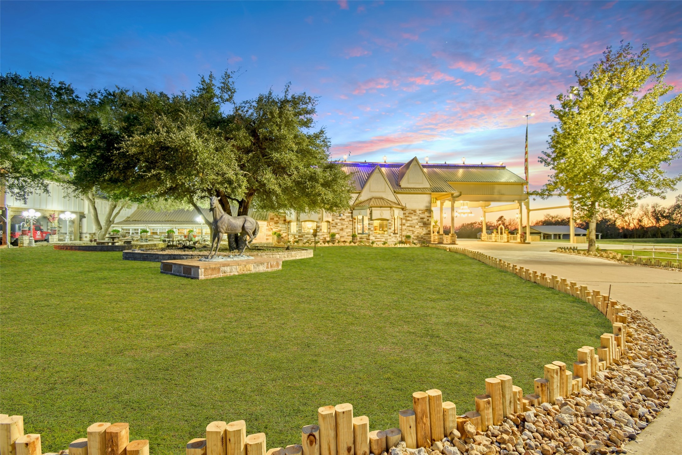 9950 Palestine Road Brenham, TX 77833 - Photo 47 of 49 The 3.5+ acre underground fed pond stretches from both sides of the main driveway to the front of the home. The main home has a metal roof with Hardiplank and 3 different coatings ranging from 16-gauge to 22-gauge galvalume material.