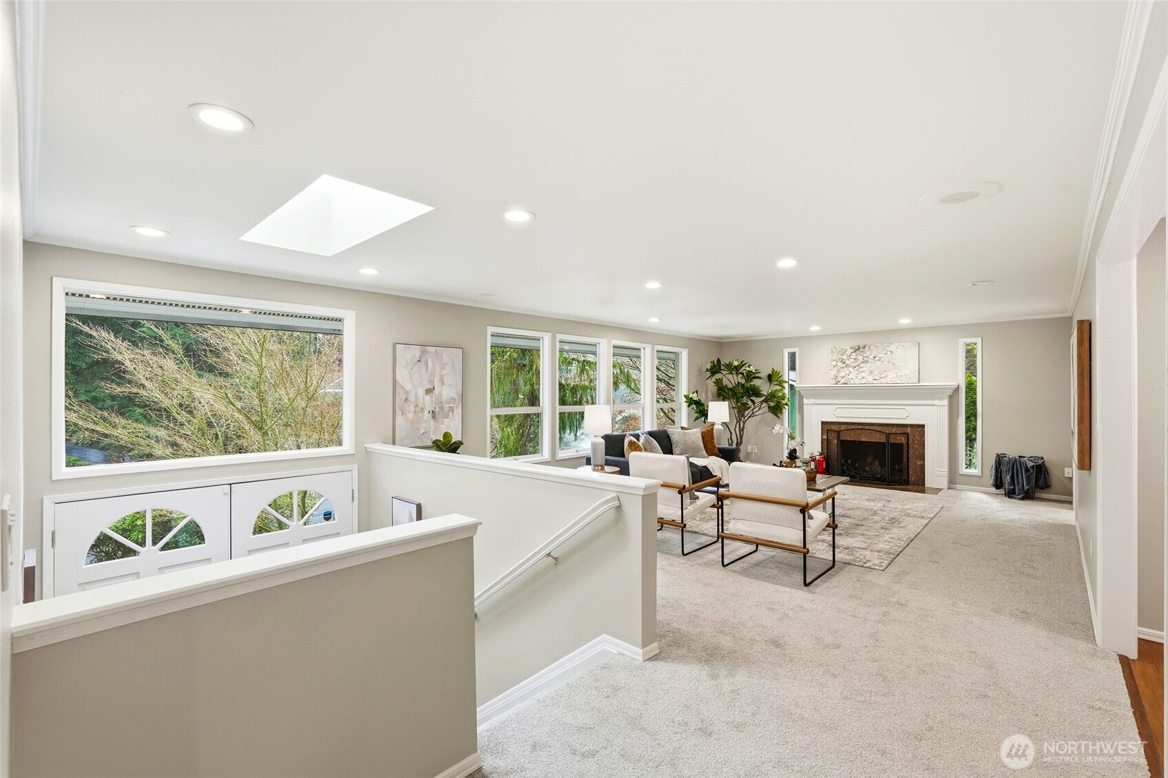 4822 Fowler Avenue Everett, WA 98203 - Photo 12 of 40 a living room with furniture a fireplace and a large window