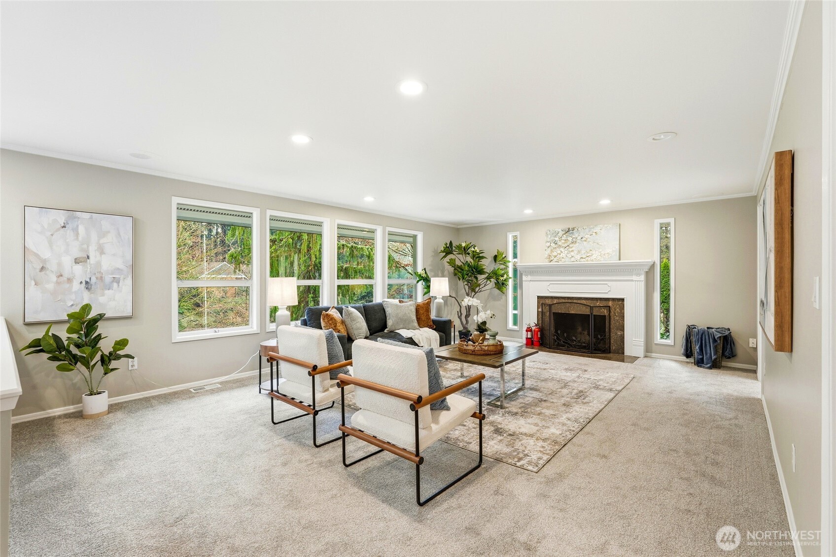 4822 Fowler Avenue Everett, WA 98203 - Photo 13 of 40 a living room with furniture a fireplace and a potted plant