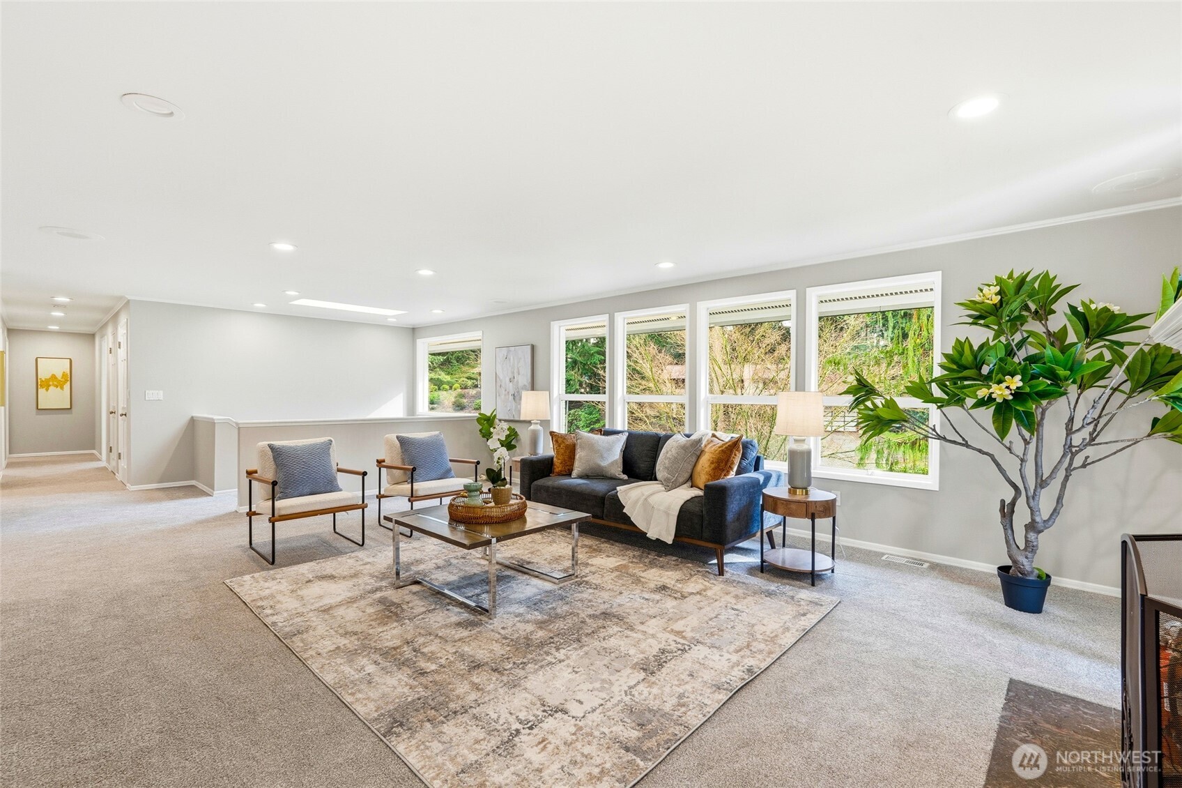 4822 Fowler Avenue Everett, WA 98203 - Photo 15 of 40 a living room with furniture a large window and a potted plant