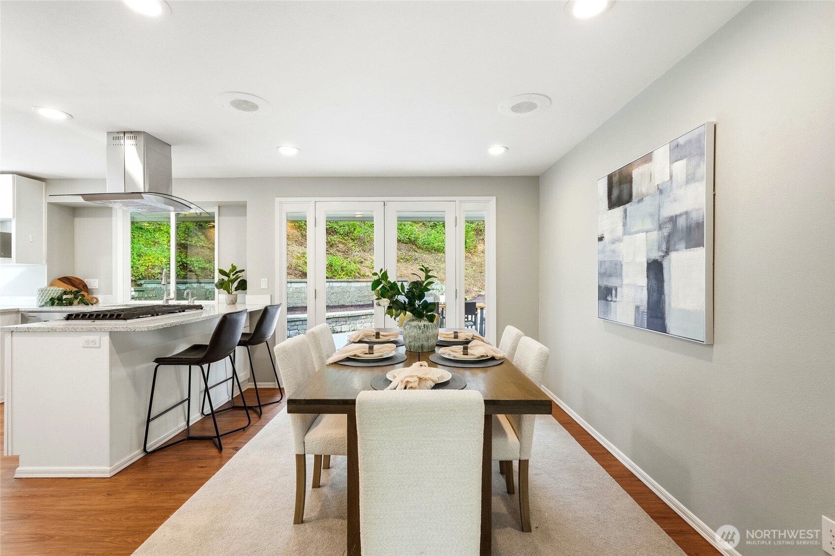 4822 Fowler Avenue Everett, WA 98203 - Photo 17 of 40 a very nice looking dining room with kitchen island furniture a large window and a refrigerator