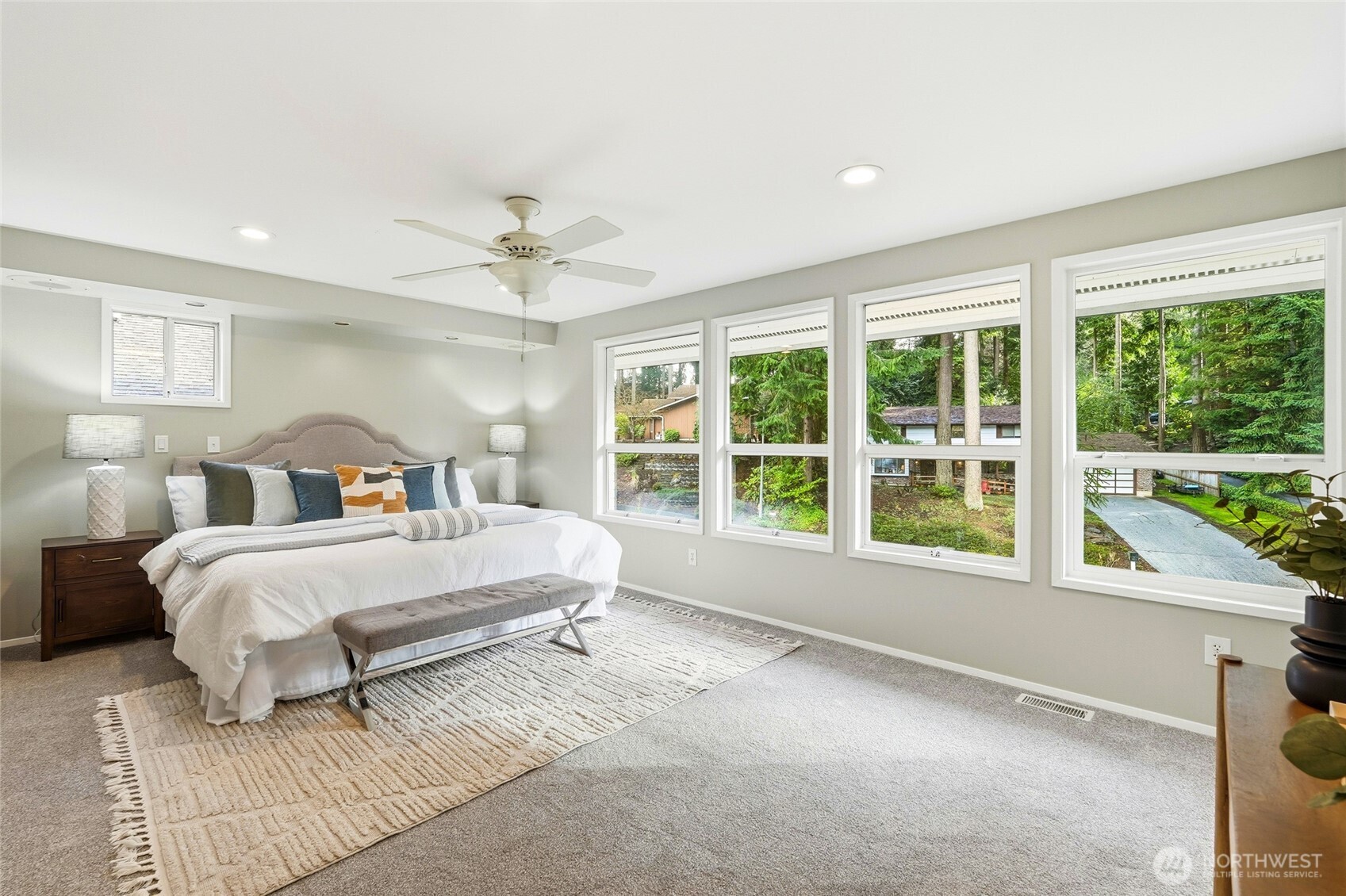 4822 Fowler Avenue Everett, WA 98203 - Photo 19 of 40 a bedroom with a large bed and a large window
