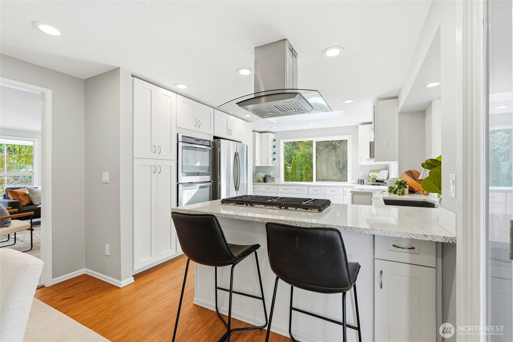 4822 Fowler Avenue Everett, WA 98203 - Photo 2 of 40 a kitchen with stainless steel appliances granite countertop a stove and a refrigerator
