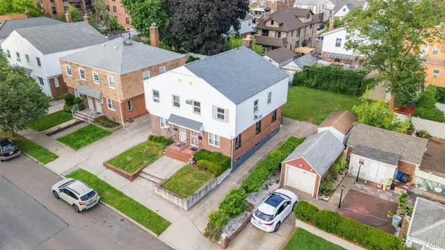 an aerial view of a house with a garden