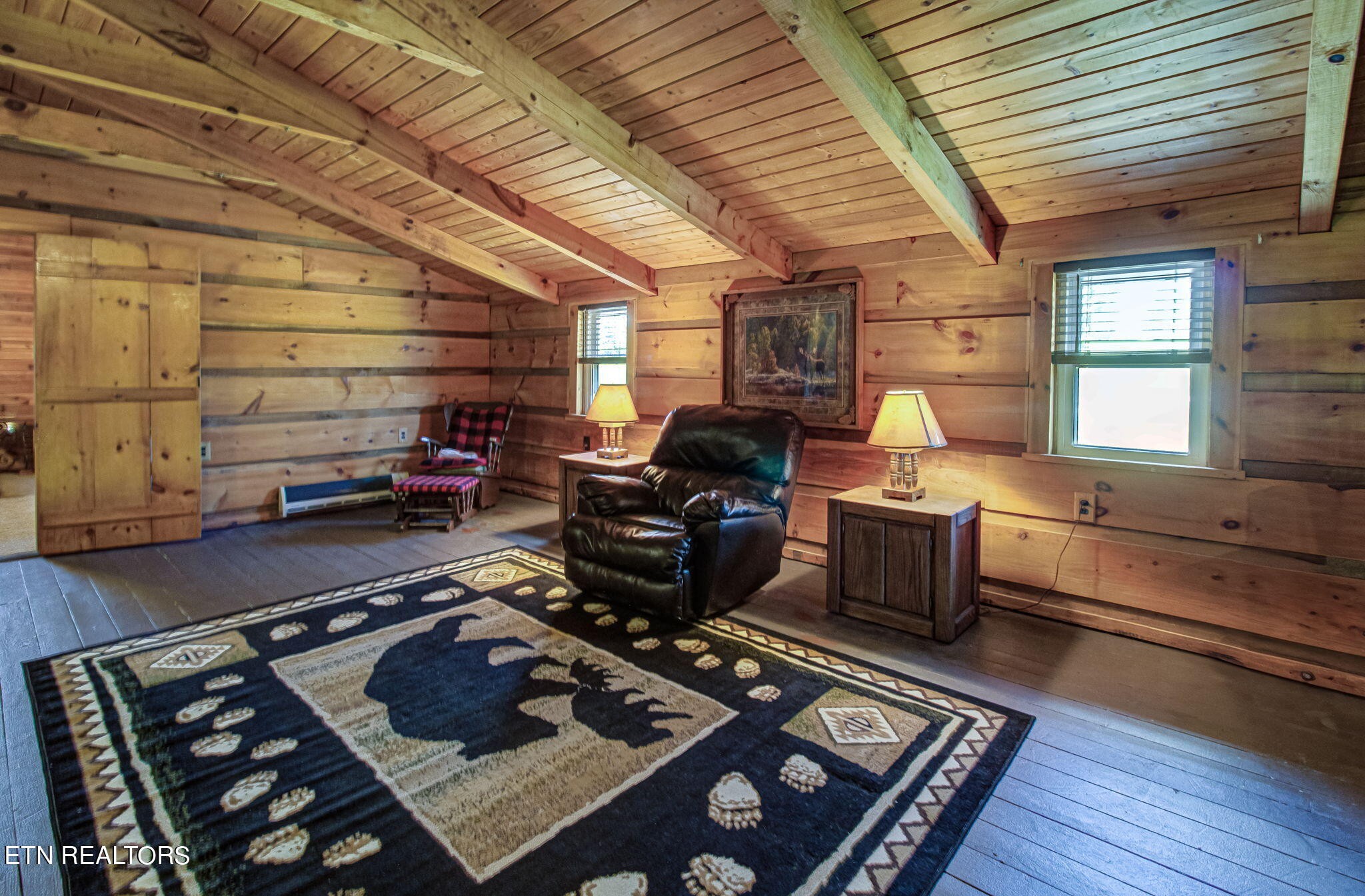 433 Brakebill School Road Madisonville, TN 37354 - Photo 41 of 60 a living room with furniture and a wooden floor