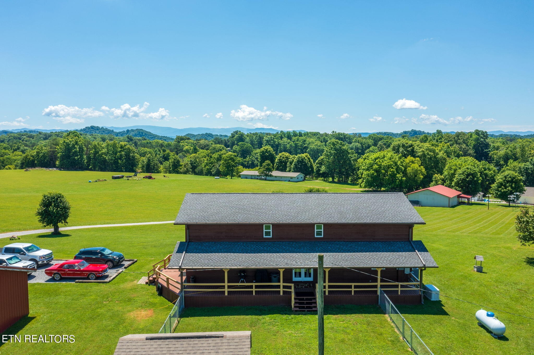 433 Brakebill School Road Madisonville, TN 37354 - Photo 45 of 60 a view of a big yard with a swimming pool