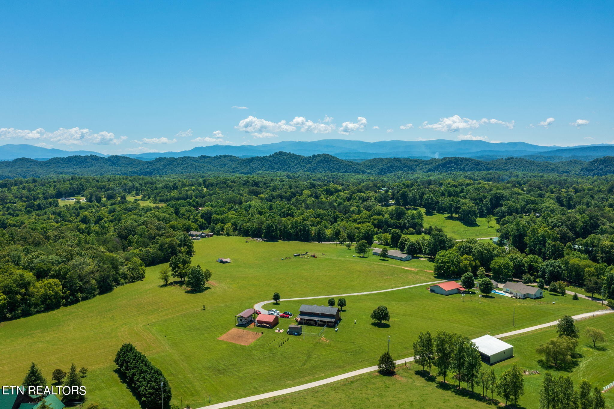 433 Brakebill School Road Madisonville, TN 37354 - Photo 47 of 60 a view of a golf course with chairs