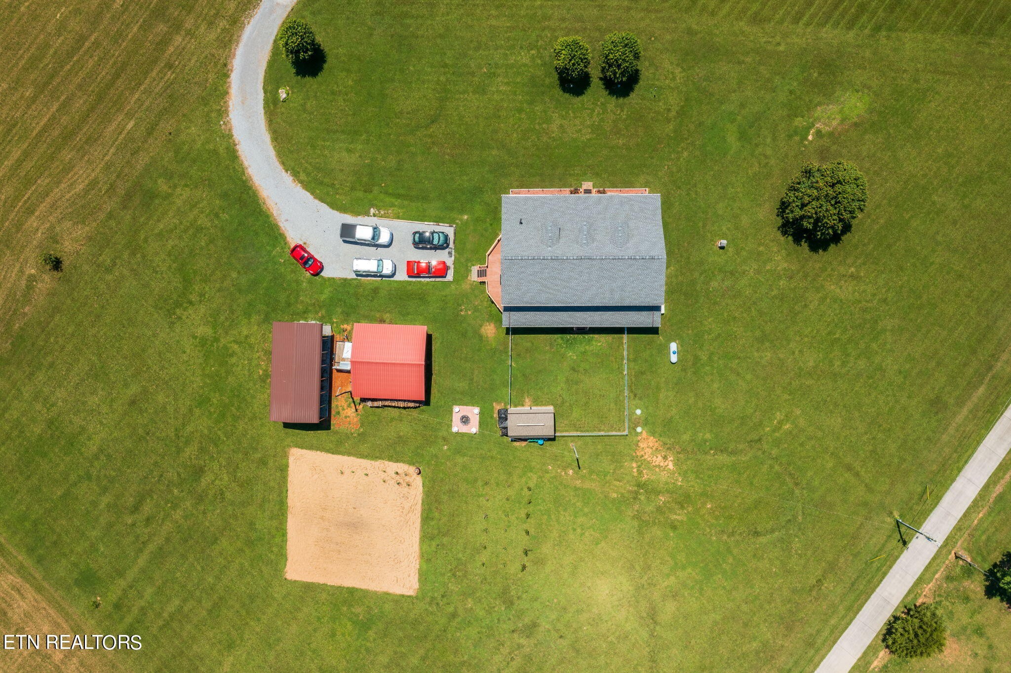 433 Brakebill School Road Madisonville, TN 37354 - Photo 58 of 60 an aerial view of a house with a swimming pool