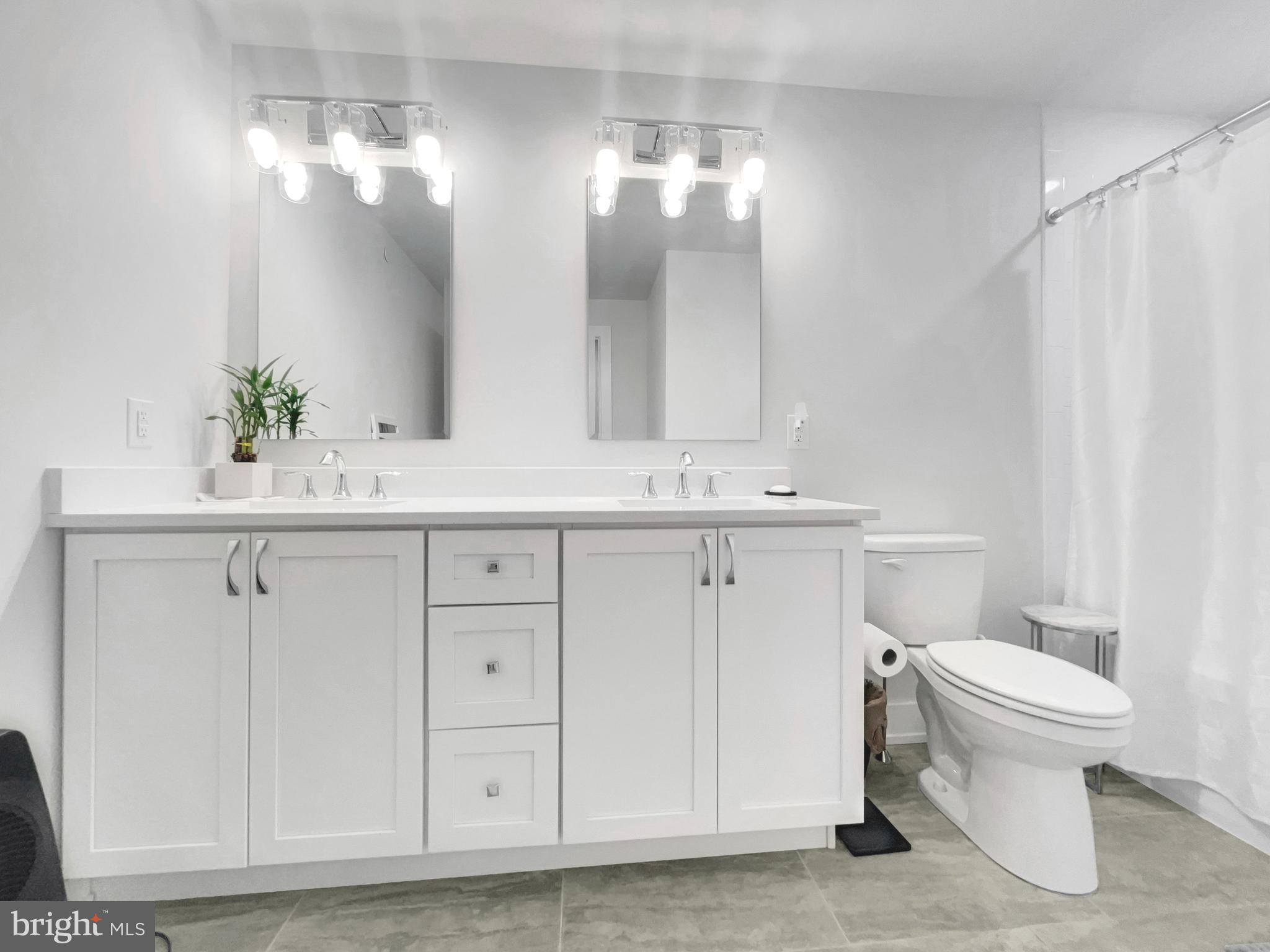 2001 Hyview Terrace Dresher, PA 19025 - Photo 17 of 26 a bathroom with a sink and a mirror